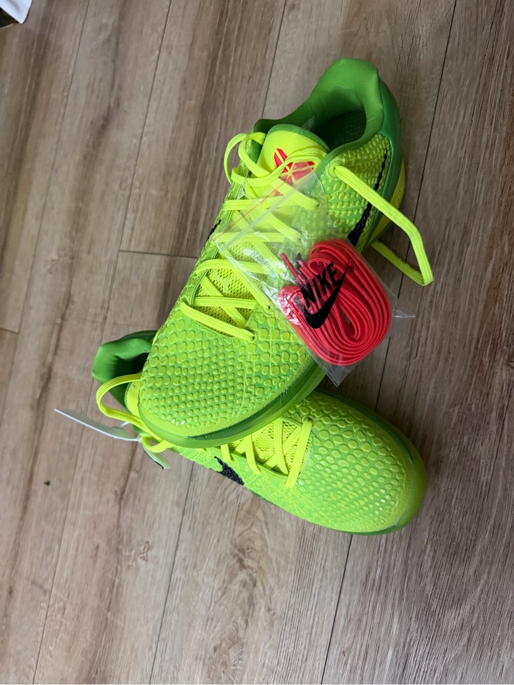 Nike Kids Bright Neon Green Athletic Sneakers with Extra Red Laces its new